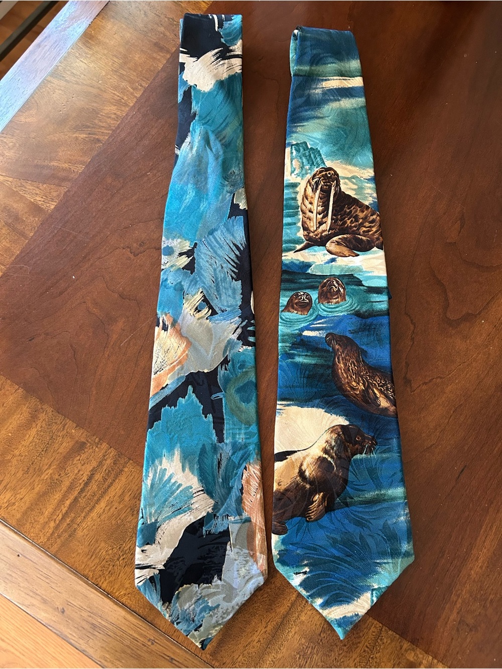 One Endangered Species Blue and Teal Seal & Ocean Print Tie and One Raphael Tie